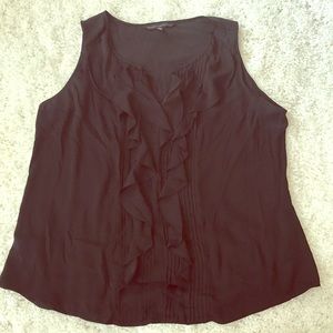 Ruffle front sleeveless blouse